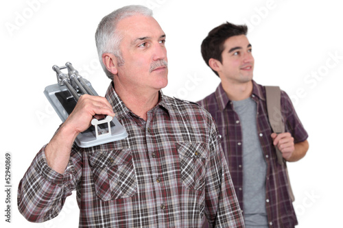 Photo: Learning with experienced tiler Learning with experienced tiler