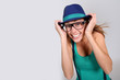 Foto: Stylish girl with suspenders showing big smile Stylish girl with suspenders showing big smile