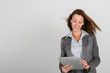 Smiling businesswoman using digital tablet