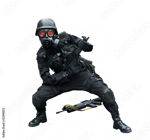 Photo: Special force soldier posing funny in isolation background . Special force soldier posing funny in isolation background .