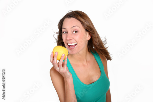 Photo: Healthy girl eating an apple Healthy girl eating an apple