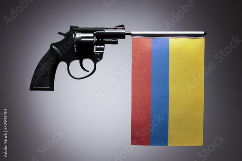 Photo: Gun crime concept of hand pistol Gun crime concept of hand pistol
