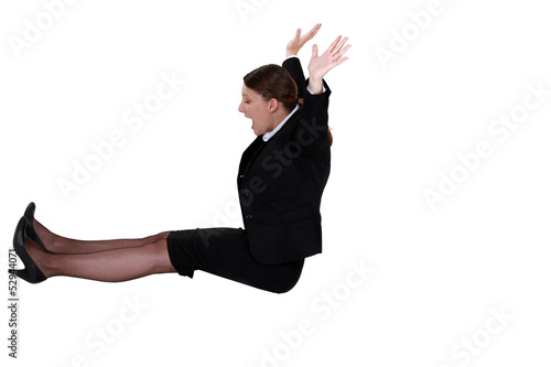 Photo: A businesswoman on a edge. A businesswoman on a edge.