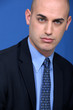 Poetrait of bald executive