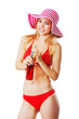 blonde girl in beachwear drinking lemonade and having fun