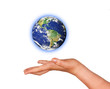Planet earth on palm.Elements of this image furnished by NASA