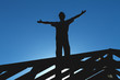 Worker welcoming the sun starting the workday