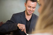 Businessman Having Meal With Female Colleague