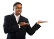 Photo: Indian business man showing blank space. Indian business man showing blank space.