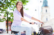 Woman Riding A Bike In The City
