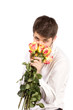 Man with bouquet of red roses.