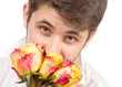Man with bouquet of red roses.