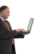 Foto: Senior businessman with a laptop Senior businessman with a laptop