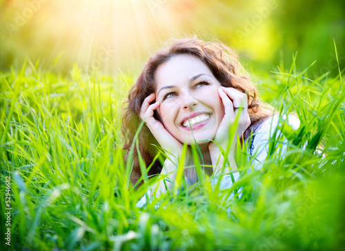 Photo: Young Woman Outdoors. Enjoy Nature Young Woman Outdoors. Enjoy Nature