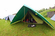 lined tents in a scout camp open air in the middle of nature