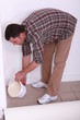 Man pouring plaster