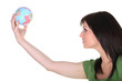 Photo: Woman in green reaching out to the world Woman in green reaching out to the world