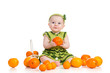 Photo: happy baby girl with fruits isolated on white background happy baby girl with fruits isolated on white background