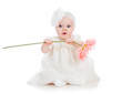 baby girl holding flower gift, isolated on white