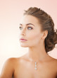 woman wearing shiny diamond necklace