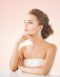 woman wearing shiny diamond earrings