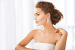woman wearing shiny diamond earrings