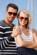 Photo: happy young couple in port happy young couple in port