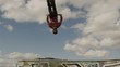 BMXer Backflip Against Sky