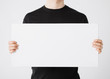 Photo: man with blank white board man with blank white board