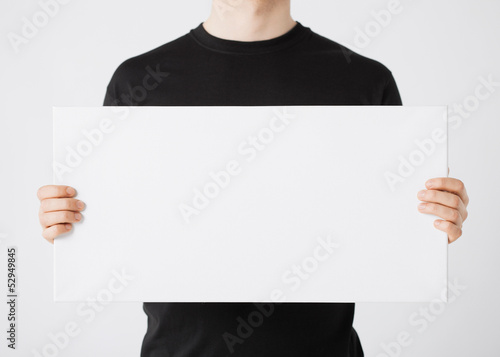 Photo: man with blank white board man with blank white board