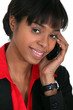 Photo: Smiling businesswoman taking a phone call Smiling businesswoman taking a phone call