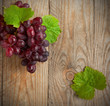 Grapes on a wooden background