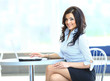 Attractive smiling young business woman