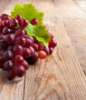 Grapes on a wooden background