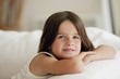 Foto: little girl posing on the sofa little girl posing on the sofa
