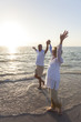 Photo: Happy Senior Couple Walking Holding Hands Tropical Beach Happy Senior Couple Walking Holding Hands Tropical Beach