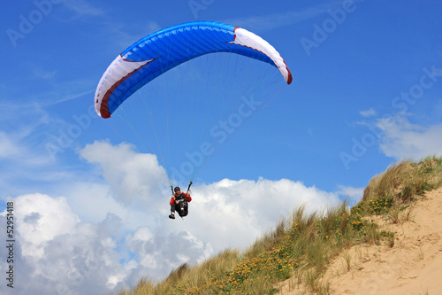 Photo: paraglider on sand dunes paraglider on sand dunes