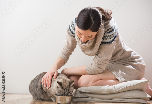 Photo: Beautiful young woman and her cat Beautiful young woman and her cat