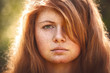 portrait of the rural red-haired girl