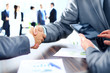 Photo: Business people shaking hands Business people shaking hands