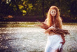 portrait of the rural red-haired girl