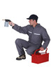 Photo: Workman with a blowtorch Workman with a blowtorch