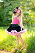 portrait of little girl outdoors in summer