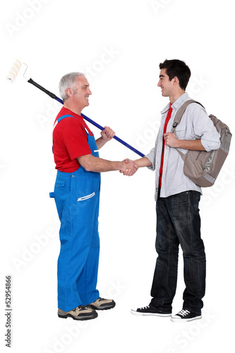 Photo: Decorator welcoming a new apprentice Decorator welcoming a new apprentice