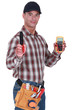 Craftsman with tweezers and voltmeter