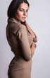 Young sensual & beauty woman in a fashionable dress.