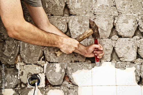 Photo: Breaking ceramic tiles Breaking ceramic tiles