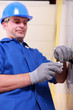 Photo: Electrician wiring a light switch Electrician wiring a light switch