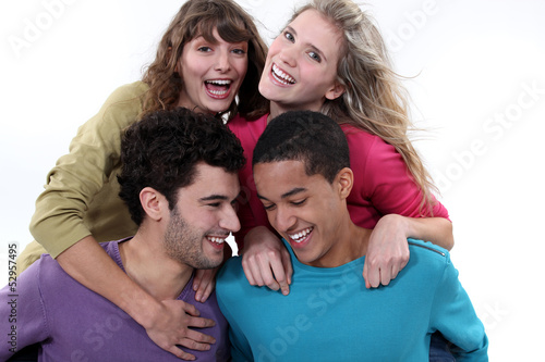 Photo: A group of friends laughing together A group of friends laughing together