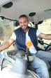 Photo: Farmer in the cab of his tractor Farmer in the cab of his tractor